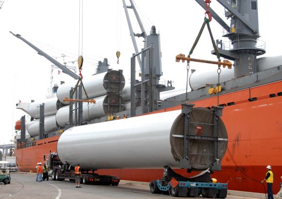 Wind_turbine_towers_being_unloaded_at_a_port-1.jpg Wind_turbine_towers_being_unloaded_at_a_port-1.jpg